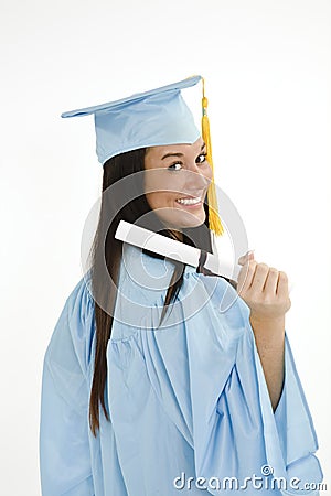 Beautiful Caucasian woman wearing a blue graduation gown holding diploma Stock Photo