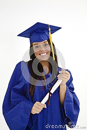 Beautiful Caucasian woman wearing a blue graduation gown holding diploma Stock Photo