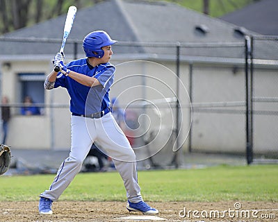 Teen baseball batter Stock Photo