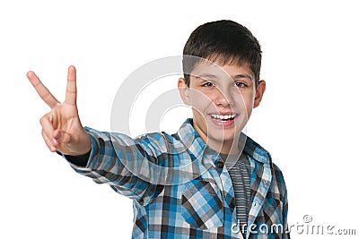 Teen boy celebrates victory Stock Photo