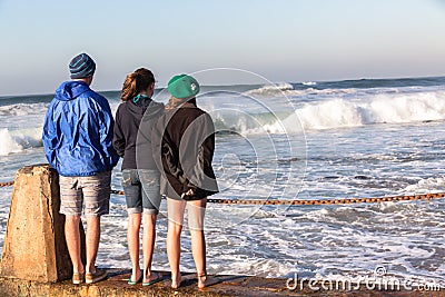 Teen Boy Girls Beach Waves Stock Photo