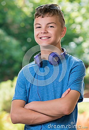 Teen boy with headphones Stock Photo