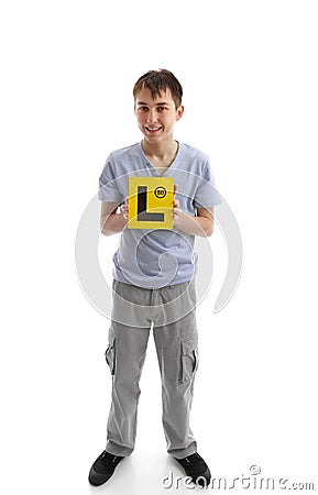 Teen boy holding L learner plates Stock Photo