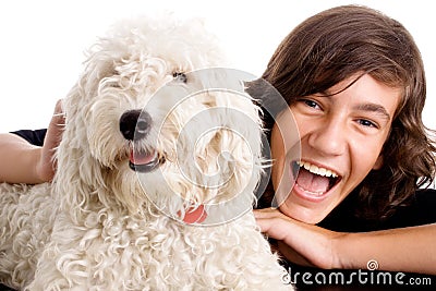Teen boy with white dog Stock Photo