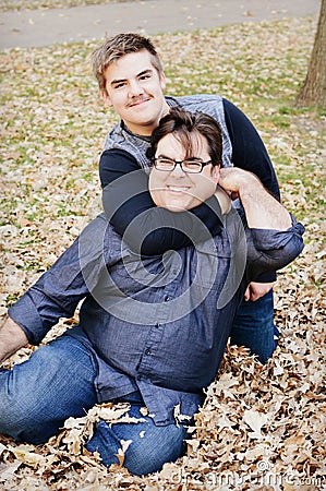 Teen Boy Wrestling with Dad Stock Photo