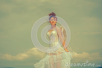 Teen cupid, valentine day. Teenager angel with angels wings. Stock Photo