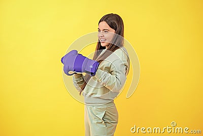 teen defense. girl sport training. sport active wear. Teen boxer training with determination. teen girl in boxing goves Stock Photo