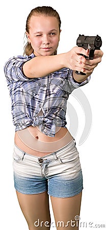 Teen girl aiming from the gun Stock Photo