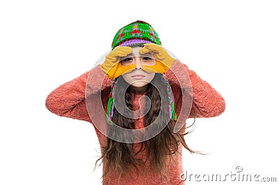 Teen girl in earflap hat of winter fashion style and knitted warm sweater with mittens isolated on white Stock Photo