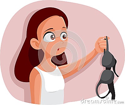 Teen Girl Experiencing Puberty Holding a Bra Vector Illustration