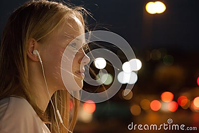 Teen girl with headphones portrait. Teenager listening to music. Headphones dream happy Stock Photo