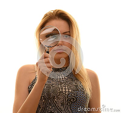 Teen girl with magnifying glass Stock Photo