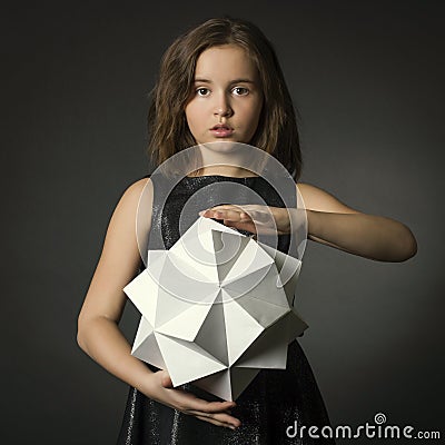 Teen girl with paper in hand polygon figure. Stock Photo