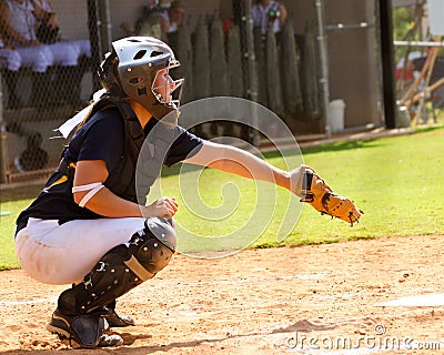 Teen girl playing softball Stock Photo