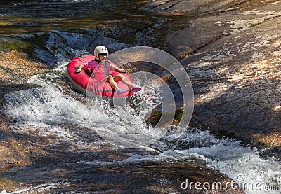 Teen girl rafting Stock Photo