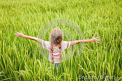 Teen girl on the rice paddies Stock Photo