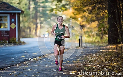 Teen Girl Runs Alone on Leafy Path in Saratoga State Park Editorial Stock Photo