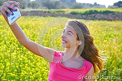 Teen girl selfie video photo spring meadow Stock Photo