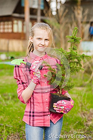 Teen girl with tree seedling Stock Photo