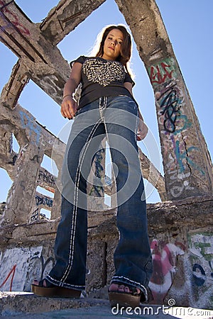 Teen Girl in Urban Ruins Stock Photo