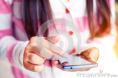 teen girl using phone Stock Photo