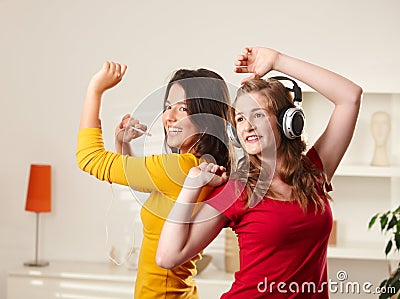 Teen girls listening to music Stock Photo