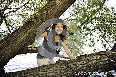 Teen between the Limbs Stock Photo