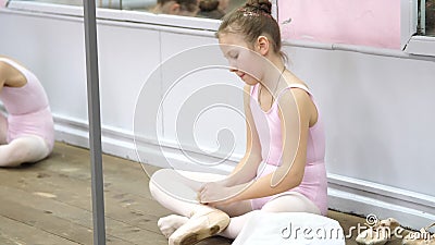 Teen Little Girl in a Pink Leotard, Prepares for Classical Ballet Dance Lesson in a Ballet School. she Putting on Her Stock Footage - Video of femininity, background: 146701318 