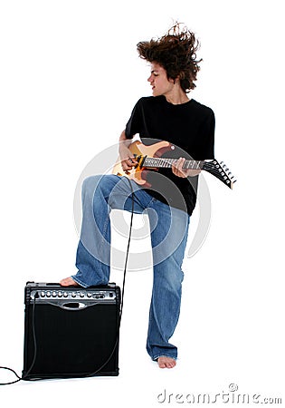 Teen playing electric guitar Stock Photo