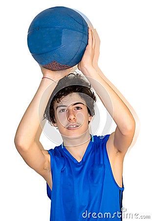 Teen sportsman holding basketball Stock Photo