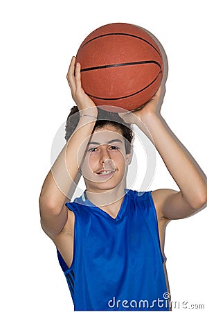 Teen sportsman playing basketball Stock Photo