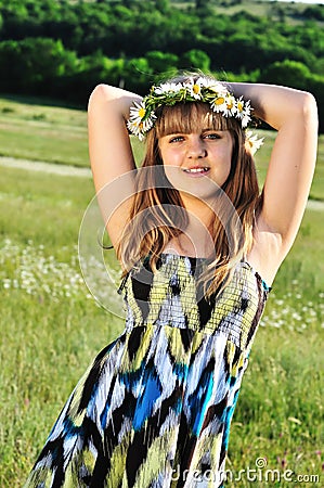 Teen wearing wreath Stock Photo