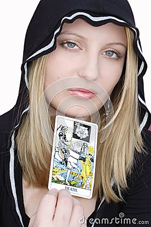 Teen witch with tarot card Stock Photo