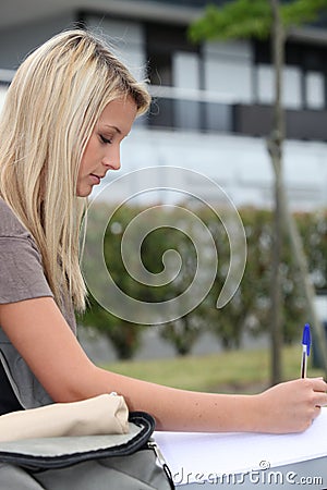 Teen writing a letter Stock Photo