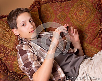 Teenage boy with Electronic Device Stock Photo