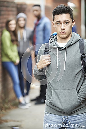 Teenage Boy Feeling Intimidated As He Walks Home Stock Photo