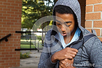 Teenage boy having problems at school Stock Photo