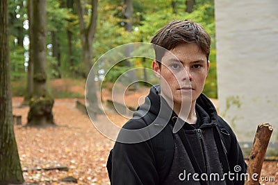 Portrait of a teenage boy in autumn forest Stock Photo