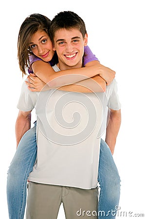 Teenage boy piggybacking teenage girl Stock Photo