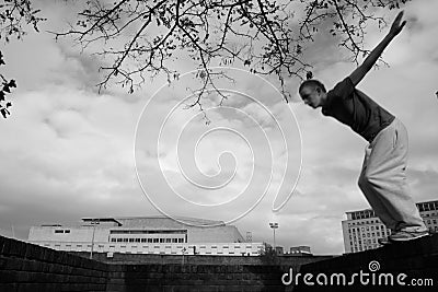 Teenage boy practicing free running Stock Photo