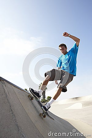 Teenage Boy In Skateboard Park Stock Photo