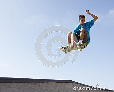 Teenage Boy In Skateboard Park Stock Photo