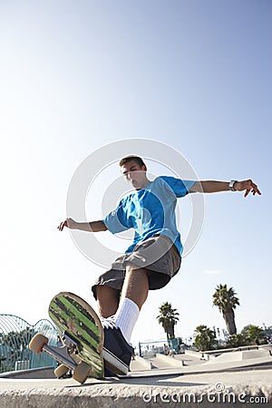 Teenage Boy In Skateboard Park Stock Photo