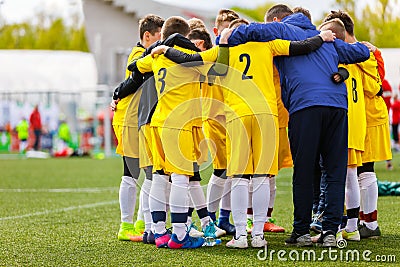 Teenage Boys in Sports Team. Boys Huddling in a Circle with Coach Before the Final Game Editorial Stock Photo