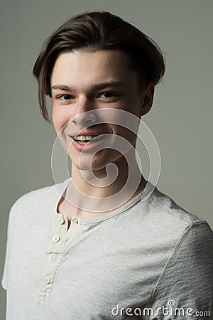 Teenage concept. Happy teenage boy. Teenager enjoy teenage time. Teenage model with candid smile Stock Photo