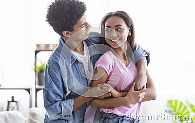 Teenage couple in love having romantic tender moments at home Stock Photo