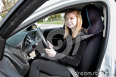 Teenage driver in car Stock Photo