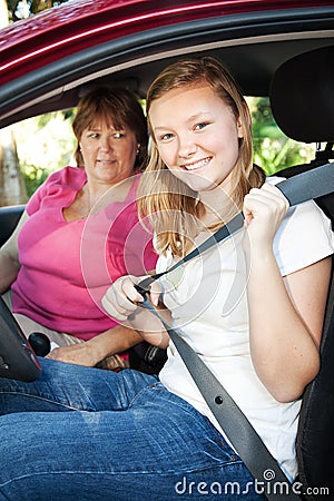 Teenage Driver Fastens Seatbelt Stock Photo