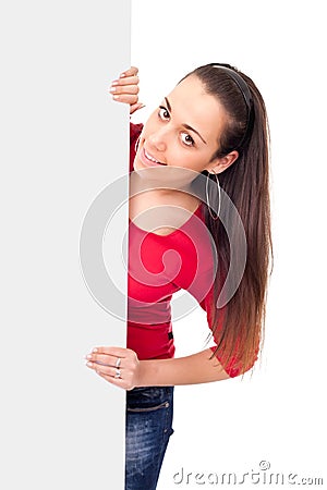 Teenage girl behind empty billboard Stock Photo