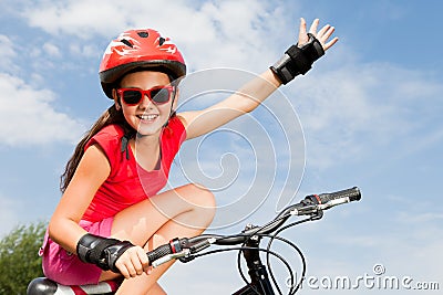 Teenage girl on a bicycle Stock Photo